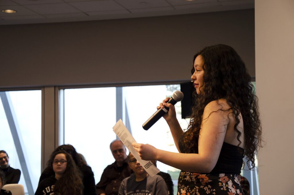 Cinthia presenting research