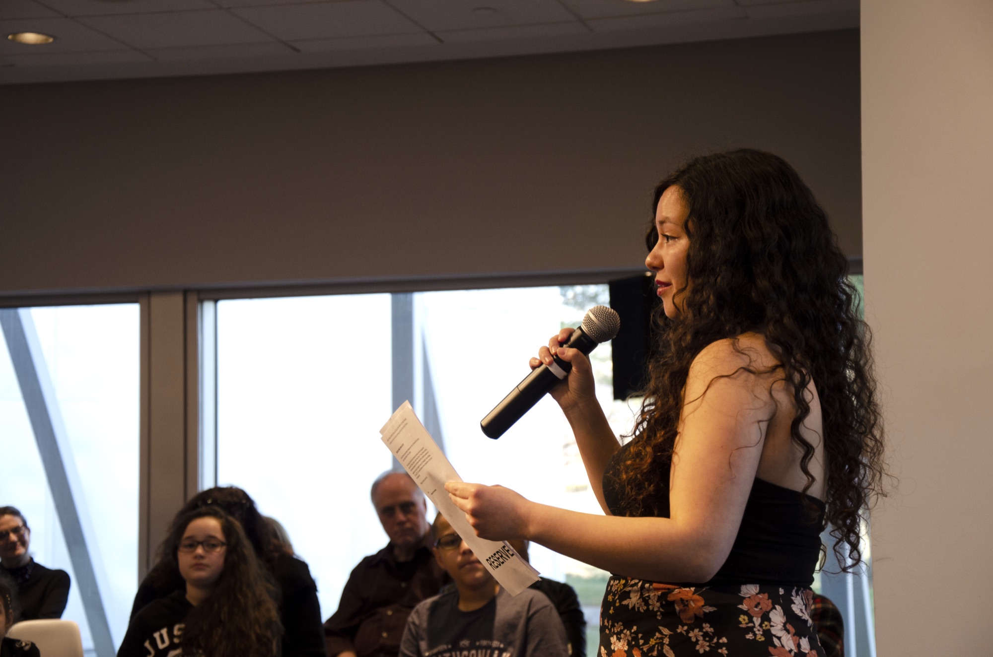Cinthia presenting research