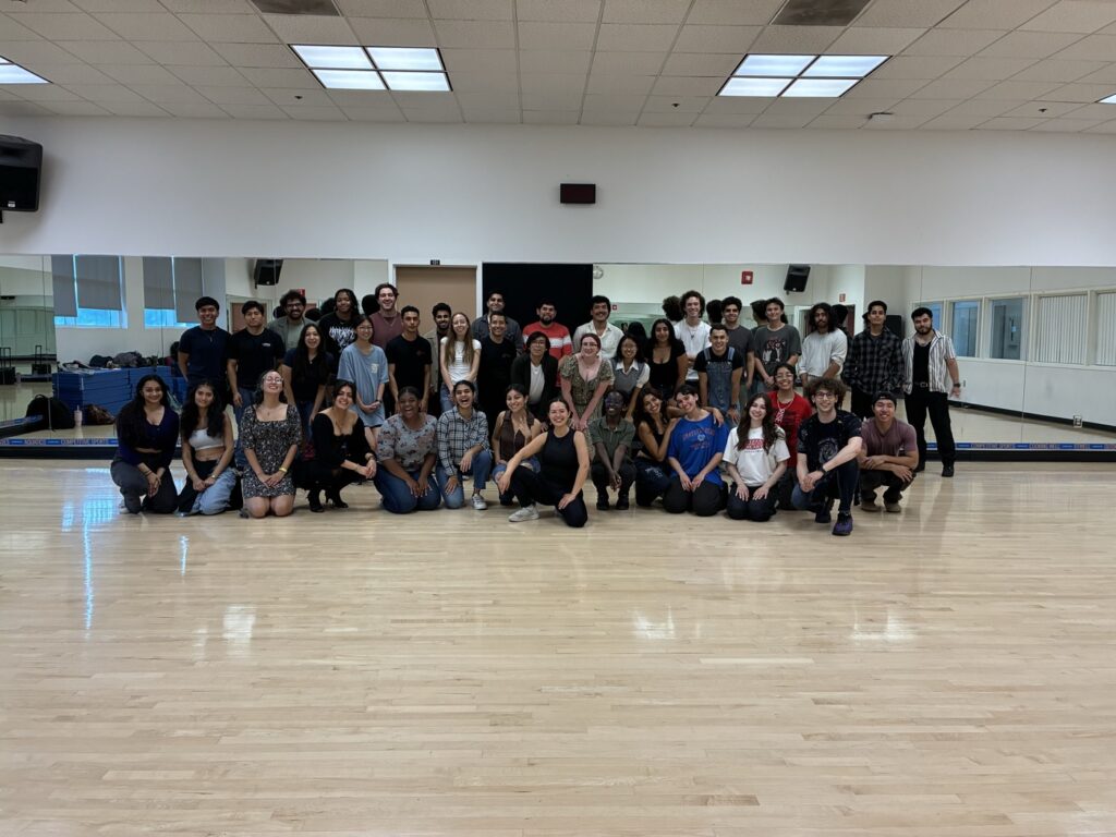 Cinthia Durán with a large student group after a guest salsa workshop at the UC Riverside recreation studio