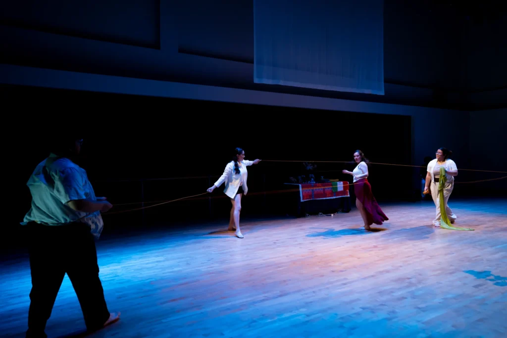Ritwal — dancers drawing coloured ribbons taut across the stage, UC Riverside Department of Dance, Spring Forward 2023